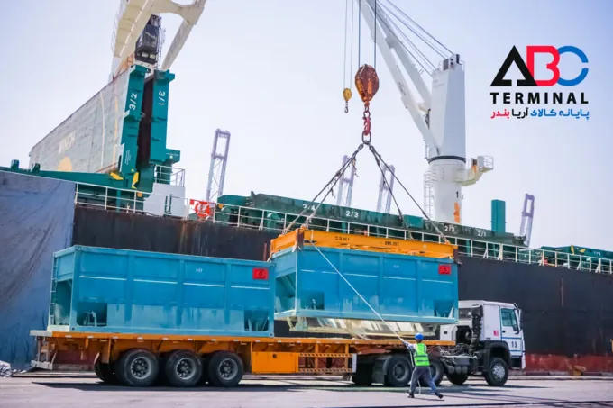 Crane and truck operations alongside a vessel